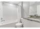 Clean bathroom with white subway tile and granite countertop at 7960 Formosa Valley Pl, Kissimmee, FL 34747