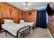 Themed bedroom with two twin beds and Hogwarts house banners at 7960 Formosa Valley Pl, Kissimmee, FL 34747