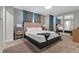 Spacious bedroom with plush bed, large mirror, and ample floor space at 7960 Formosa Valley Pl, Kissimmee, FL 34747