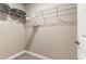 Walk-in closet with wire shelving and ample hanging space at 7960 Formosa Valley Pl, Kissimmee, FL 34747