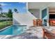 Private pool area with patio furniture and a small plunge pool at 7960 Formosa Valley Pl, Kissimmee, FL 34747