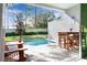 Enjoy this private pool with patio furniture and fenced backyard at 7960 Formosa Valley Pl, Kissimmee, FL 34747
