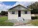 House with front yard, steps leading to the entrance at 828 Willie Mays Pkwy, Orlando, FL 32811