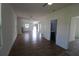 Hardwood floor living room with access to backyard and other rooms at 828 Willie Mays Pkwy, Orlando, FL 32811