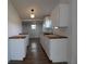 Modern kitchen with white cabinets and butcher block countertops at 828 Willie Mays Pkwy, Orlando, FL 32811