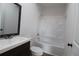 Clean bathroom, featuring a tub and updated vanity at 828 Willie Mays Pkwy, Orlando, FL 32811