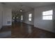 Long living room with hardwood floors and kitchen view at 828 Willie Mays Pkwy, Orlando, FL 32811