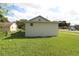 View of detached single car garage in backyard at 828 Willie Mays Pkwy, Orlando, FL 32811