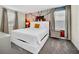 Bedroom with a king-size bed and a New York City-themed wall mural at 730 Drop Shot Dr, Davenport, FL 33896