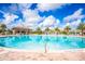 Large resort-style pool with a swim-up bar at 730 Drop Shot Dr, Davenport, FL 33896