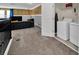 Upper-level laundry room with washer, dryer, and extra storage at 730 Drop Shot Dr, Davenport, FL 33896