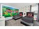 bedroom with twin beds and playful Mickey Mouse theme at 730 Drop Shot Dr, Davenport, FL 33896