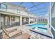 Private pool and spa with plenty of lounge chairs at 730 Drop Shot Dr, Davenport, FL 33896