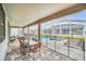 Patio with dining table and access to a private pool at 730 Drop Shot Dr, Davenport, FL 33896