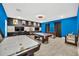 Finished basement game room, featuring pool table, air hockey, and foosball at 730 Drop Shot Dr, Davenport, FL 33896