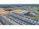 Aerial view of community with various houses and landscape at 730 Drop Shot Dr, Davenport, FL 33896