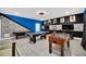 Basement game room with pool table, foosball, and air hockey at 730 Drop Shot Dr, Davenport, FL 33896