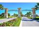Grand entrance to the community with landscaping at 730 Drop Shot Dr, Davenport, FL 33896