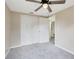 Bedroom with double door closet and access to bathroom at 1618 Coletta Dr, Orlando, FL 32807