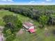 Aerial shot of a single-wide mobile home on a spacious lot with trees at 350 S 5Th St, Orlando, FL 32833