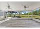 Spacious screened porch overlooking backyard and gazebo at 350 S 5Th St, Orlando, FL 32833