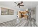 Eat-in kitchen with wood cabinets and gray vinyl flooring at 350 S 5Th St, Orlando, FL 32833