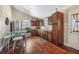Modern kitchen with wood cabinets, stainless steel appliances, and hardwood floors at 350 S 5Th St, Orlando, FL 32833