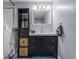 Bathroom with vanity, dark wood cabinet, and shower at 2935 Aein Rd, Orlando, FL 32817