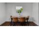 Simple dining area with a wood table and four brown chairs at 2935 Aein Rd, Orlando, FL 32817