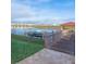 Wooden dock with kayaks and canoes, offering serene water access at 4721 Clock Tower Dr # 207, Kissimmee, FL 34746