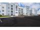 Modern apartment building with ample parking at 4721 Clock Tower Dr # 207, Kissimmee, FL 34746