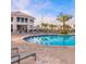 Inviting community pool with lounge chairs and a poolside clubhouse at 4721 Clock Tower Dr # 207, Kissimmee, FL 34746