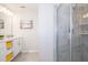 Bathroom with double vanity and a large walk-in shower at 4721 Clock Tower Dr # 207, Kissimmee, FL 34746