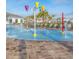Community splash pad with colorful sprayers for to enjoy at 4721 Clock Tower Dr # 207, Kissimmee, FL 34746