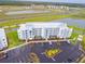 Aerial view of apartment building and parking lot at 4721 Clock Tower Dr # 207, Kissimmee, FL 34746