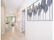 Bright hallway with tile floors and access to living areas at 4721 Clock Tower Dr # 207, Kissimmee, FL 34746