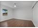 Bright bedroom with wood floors and double doors at 1213 Baranova Rd, Ocoee, FL 34761