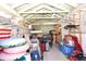 Interior view of a storage shed with shelving and various items at 985 Feather Dr, Deltona, FL 32725