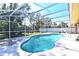 Relaxing screened-in pool and patio area at 985 Feather Dr, Deltona, FL 32725