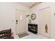 Inviting entryway with a decorative console table and shoe storage at 985 Feather Dr, Deltona, FL 32725