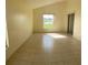 Bright Gathering room with tile floors and view of lake at 2688 Hawthorne Ln, Kissimmee, FL 34743