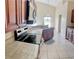 Spacious kitchen with dark wood cabinets and granite countertops at 2688 Hawthorne Ln, Kissimmee, FL 34743