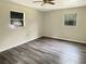 Bedroom with wood-look flooring and ceiling fan at 1904 Historic Goldsboro Blvd, Sanford, FL 32771
