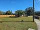 Vacant lot with grass and wooden fence at 4715 Beach Blvd, Orlando, FL 32803