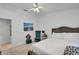 Relaxing bedroom with a king-size bed and a seating chair at 1017 Love Ln # 34, Apopka, FL 32703