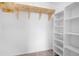 Walk-in closet with shelving and hanging rod at 1957 Teaberry Ct, Orlando, FL 32824