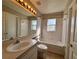 Bathroom with bathtub, toilet, and sink at 817 Highland Crest Loop, Lake Wales, FL 33853