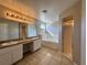 Bathroom with double vanity, garden tub and shower at 817 Highland Crest Loop, Lake Wales, FL 33853