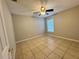 Spacious bedroom with tile flooring and ceiling fan at 817 Highland Crest Loop, Lake Wales, FL 33853