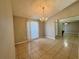 Dining room with tile floors and sliding glass doors to the patio at 817 Highland Crest Loop, Lake Wales, FL 33853